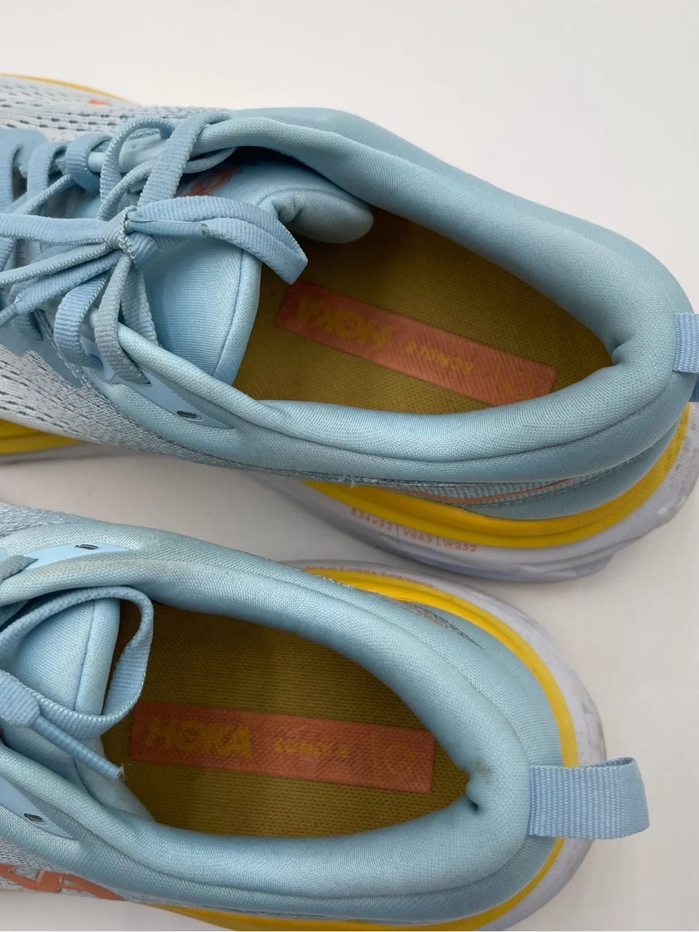 Hoka Women's Light Blue with Yellow & Orange Accent Running Shoes